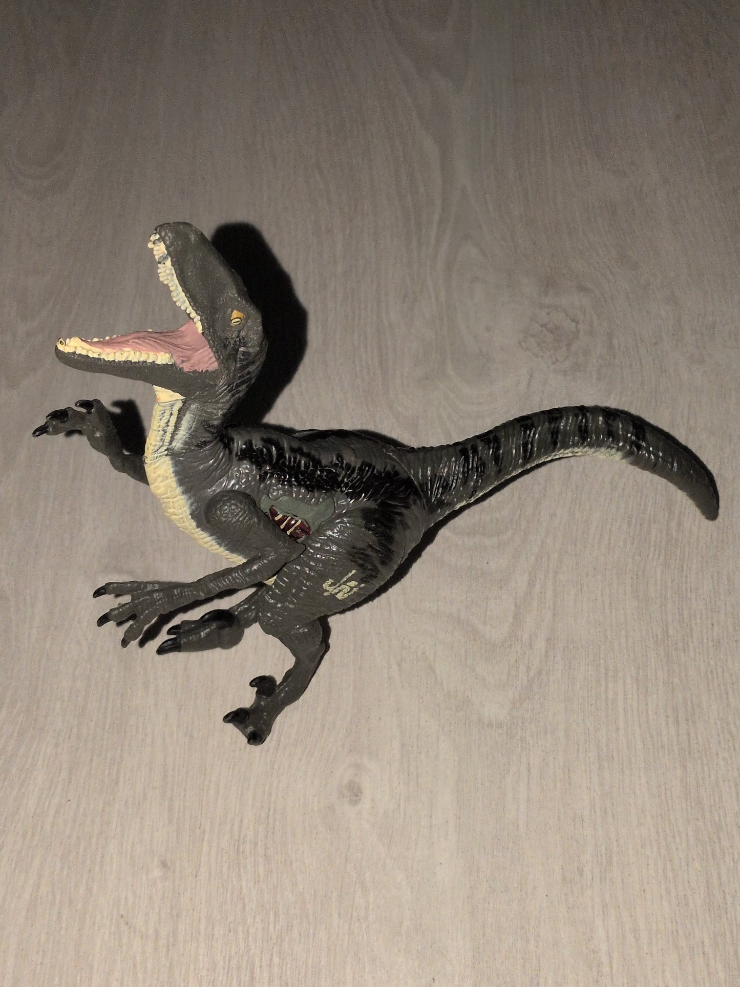 Figurine vélociraptor